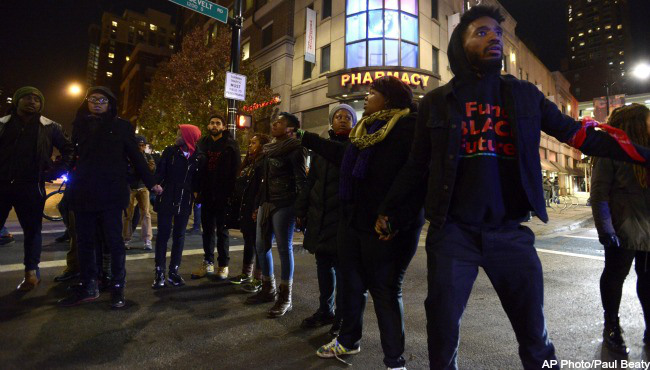 Chicago-Protesters block a street during a protest for 17-year-old Laquan McDonald